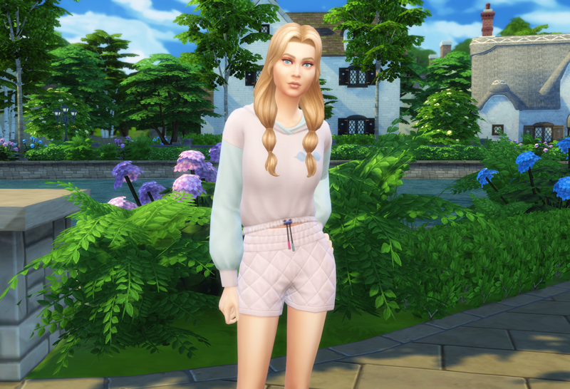 A sim styled as Aurora from Sleeping Beauty for the Sims 4 Disney Princess Legacy Challenge.